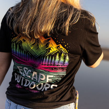 Model wearing black organic LGBTQ t-shirt outdoors